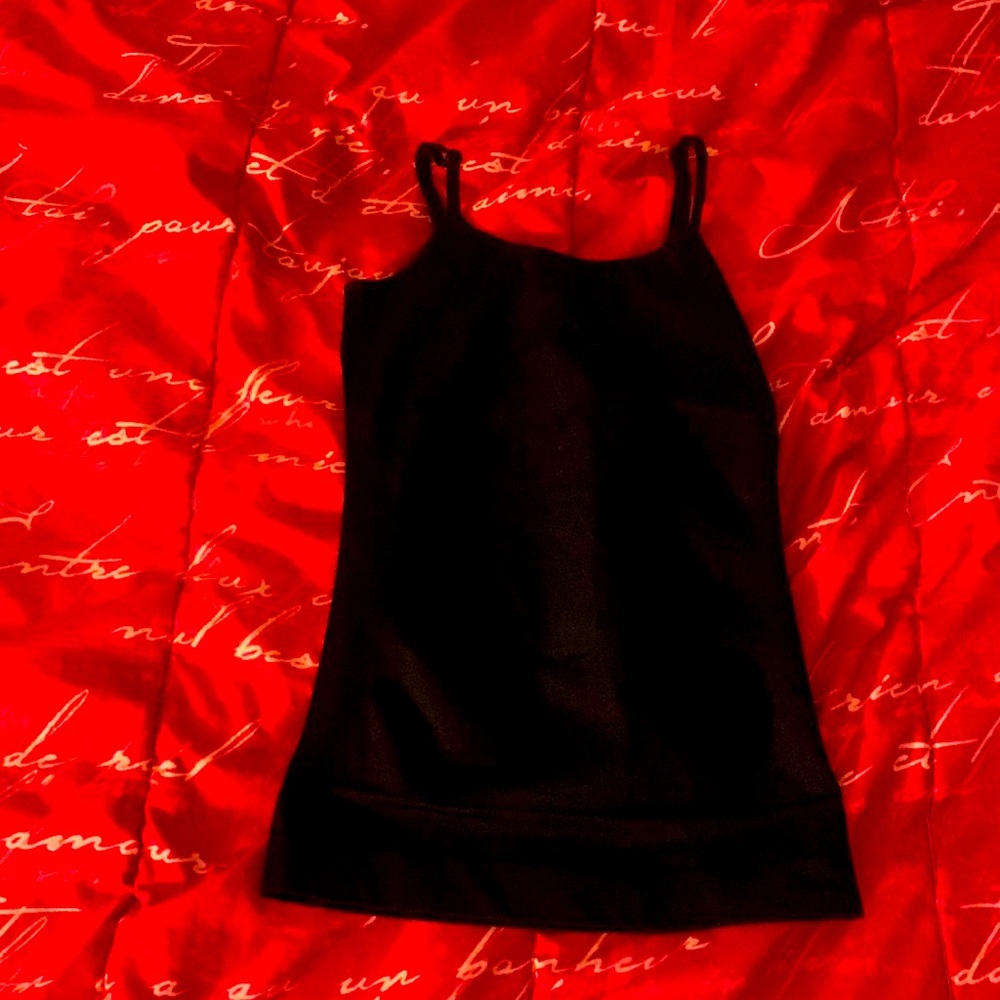 Women’s size medium, black, tight, adjustable strap under tank top